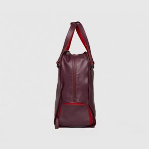 Maxi Tote in Deep Burgundy with shoe compartment. Side View